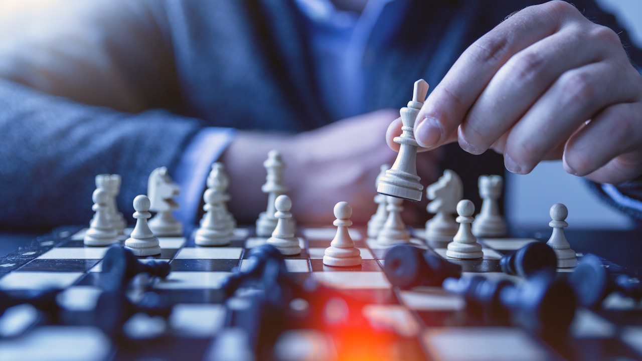Chess pieces on a board, representing strategic thinking